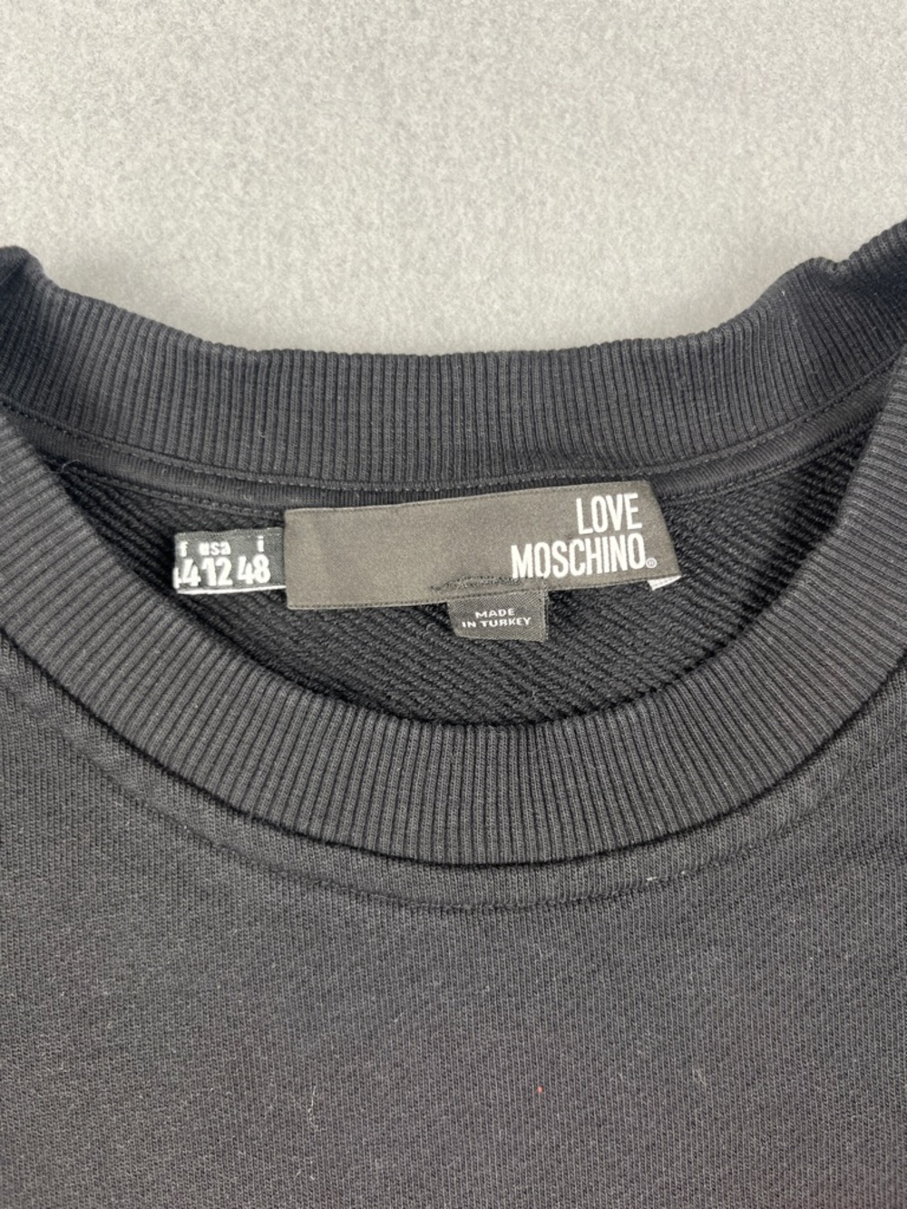 Love Moschino Black Sweatshirt with Red Heart Appliqué
Size: 12 - Picture 3 of 5